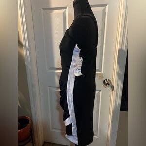 Almost Famous Black Top with Pale Pink Label